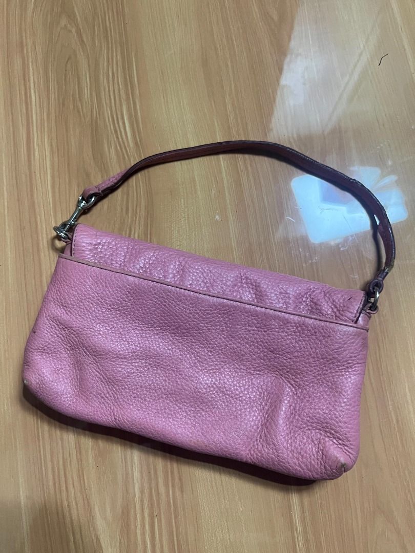 Coach Pink Leather Kili Bag Wristlet (Category: Shoulder Bags) located in Manila. Submitted by senggggg. (Listing ID 1470820734, Image 3). Description: good condition minimal sign of use need wash washable.