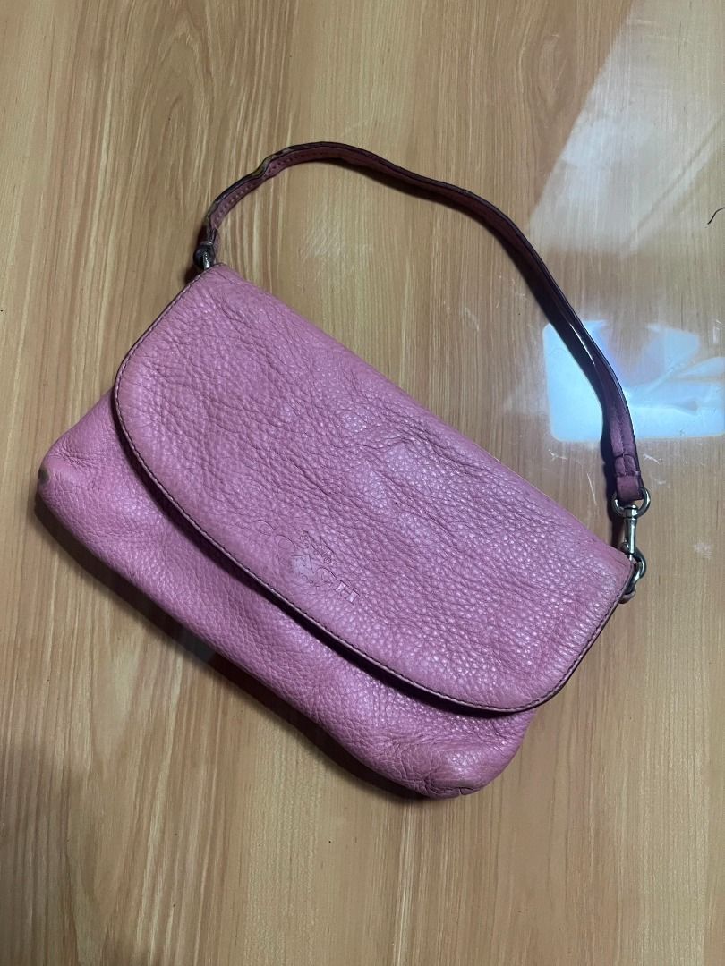 Coach Pink Leather Kili Bag Wristlet (Category: Shoulder Bags) located in Manila. Submitted by senggggg. (Listing ID 1470820734, Image 2). Description: good condition minimal sign of use need wash washable.