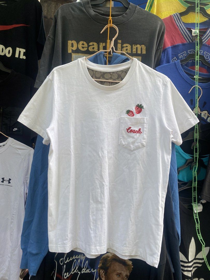 Coach pocket tee (Category: Tshirts & Polo Shirts ) located in Butuan. Submitted by angericohappy420 (Listing ID 1470774490, Image 1). Description: COACH STRAWBERRY POCKET TEE W19xL25 Cr 9/10 Authentic Excellent condition ( needwash only ).