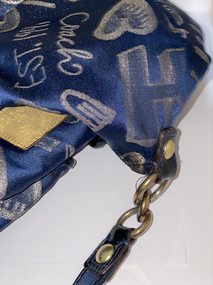 coach poppy blue signature (Category: Luxury Bags & Wallets) located in Cebu City. Submitted by vaultsbypj (Listing ID 1470893030, Image 3). Description: coach poppy blue signature 🐟🫐🩵 authentic vintage ykk zippers gold hardwares (with fading) intact patterns no visible scratches the creed inside is gone (wash it inside the wm) the strap leather are intact, the stitching around it is not intact) 📍 cebu city! can ship nationwide via jnt. 💌.