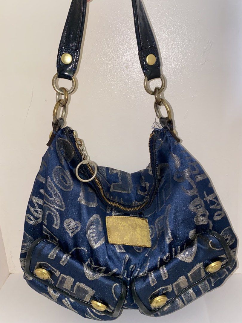 coach poppy blue signature (Category: Luxury Bags & Wallets) located in Cebu City. Submitted by vaultsbypj (Listing ID 1470893030, Image 1). Description: coach poppy blue signature 🐟🫐🩵 authentic vintage ykk zippers gold hardwares (with fading) intact patterns no visible scratches the creed inside is gone (wash it inside the wm) the strap leather are intact, the stitching around it is not intact) 📍 cebu city! can ship nationwide via jnt. 💌.