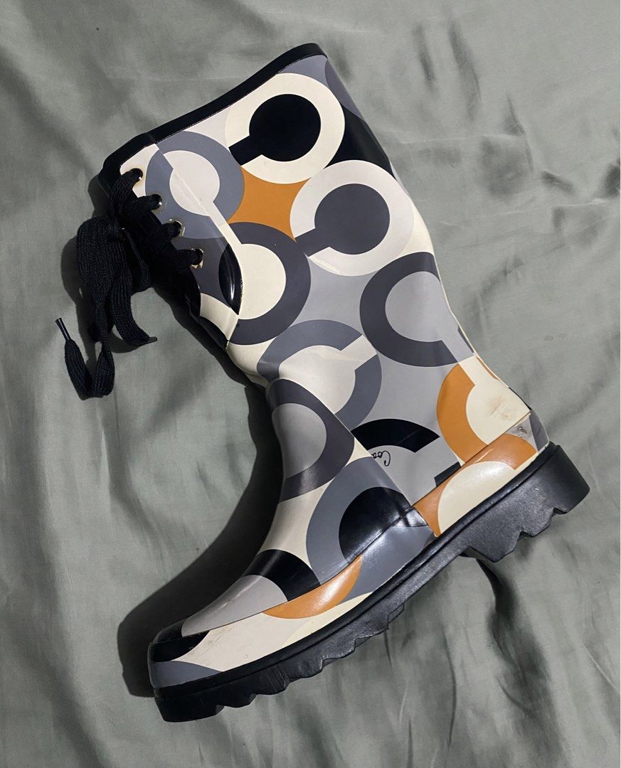 Coach Rain Boots (Category: Boots) located in Naga. Submitted by junked_garments_v2 (Listing ID 1470851603, Image 2). Description: Coach Rain Boots Excellent Condition Minimal Signs Of Use Need Cleaning Size 7 US Dm me to purchase!.