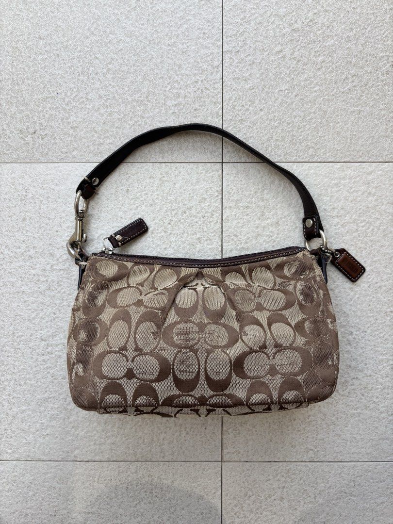 Coach Signature C Brown Canvas Small Shoulder Bag (Category: Luxury Bags & Wallets) located in San Pedro. Submitted by wharfthrift (Listing ID 1470856472, Image 2). Description: FOR SALE ‼️ Coach Signature C Brown Canvas Small Shoulder Bag CONDITION 7/10 ISSUE SIGN OF USAGE CHECK PHOTOS ₱790 + SF Shipping via lalamove or j&t meetup san pedro laguna .