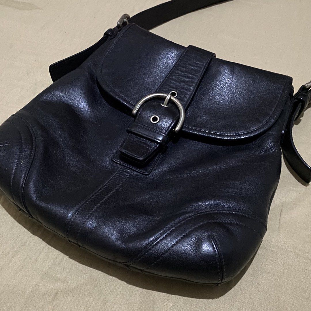 Authentic Coach Soho Soft Leather Flap Duffle/Shoulder Bag (Style #9480) (Category: Luxury Bags & Wallets) located in Pagsanjan. Submitted by y2korn (Listing ID 1470911404, Image 3). Description: Authentic Coach Soho Soft Leather Flap Duffle/Shoulder Bag (Style #9480) - Released on 2004 (Manufactured in July) - Coach New York — Soho Collection - 11.5 Inches Width - 11 Inches Length - Excellent Condition - No Scratch on Leather - Silver Buckles on
