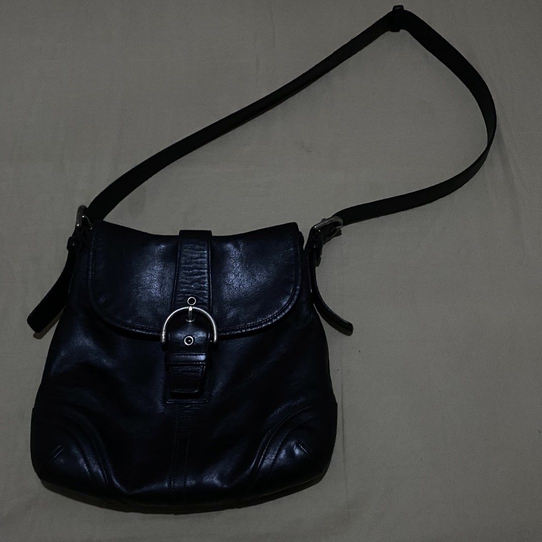 Authentic Coach Soho Soft Leather Flap Duffle/Shoulder Bag (Style #9480) (Category: Luxury Bags & Wallets) located in Pagsanjan. Submitted by y2korn (Listing ID 1470911404, Image 2). Description: Authentic Coach Soho Soft Leather Flap Duffle/Shoulder Bag (Style #9480) - Released on 2004 (Manufactured in July) - Coach New York — Soho Collection - 11.5 Inches Width - 11 Inches Length - Excellent Condition - No Scratch on Leather - Silver Buckles on