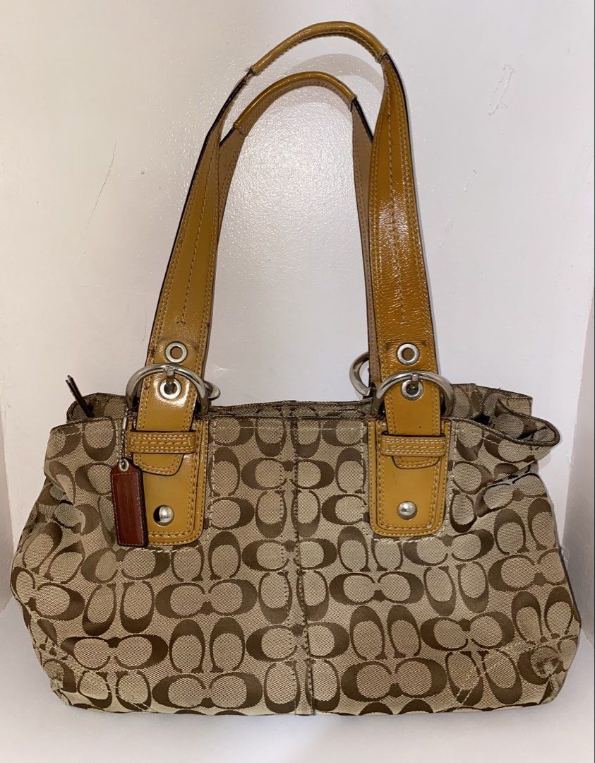 coach soho tote bag (Category: Luxury Bags & Wallets) located in Cebu City. Submitted by vaultsbypj (Listing ID 1470894738, Image 1). Description: coach signature soho tote bag 💌🪽🫧🗯️ authentic vintage ykk zippers silver hardwares (with fading) some patterns may have scratches with creed the strap leather are intact with small black spots still negotiable 📍cebu city! can ship nationwide via jnt. 💌 .