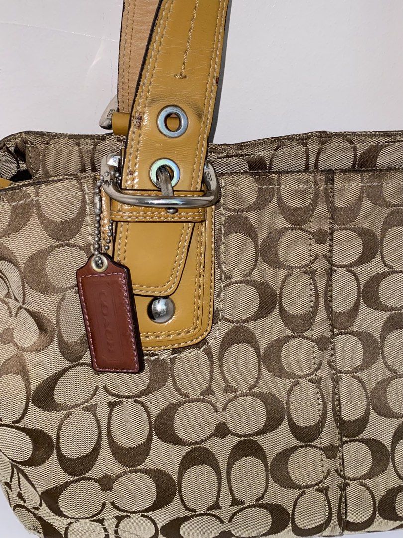 coach soho tote bag (Category: Luxury Bags & Wallets) located in Cebu City. Submitted by vaultsbypj (Listing ID 1470894738, Image 3). Description: coach signature soho tote bag 💌🪽🫧🗯️ authentic vintage ykk zippers silver hardwares (with fading) some patterns may have scratches with creed the strap leather are intact with small black spots still negotiable 📍cebu city! can ship nationwide via jnt. 💌 .