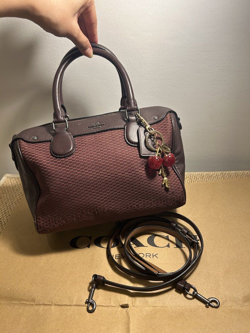 Coach Legacy Jacquard Mini Bennett Satchel (Category: Luxury Bags & Wallets) located in Legazpi City. Submitted by jjacob_018 (Listing ID 1470872996, Image 2). Description: Coach Legacy Jacquard Mini Bennett Satchel (often referred to in Bordeaux or Oxblood canvas and smooth leather). Key Details • Model: Mini Bennett Satchel • Material: Combination of canvas/jacquard fabric with smooth leather trim • Colorway: Bordeaux / Oxblood / Dark Brown • F