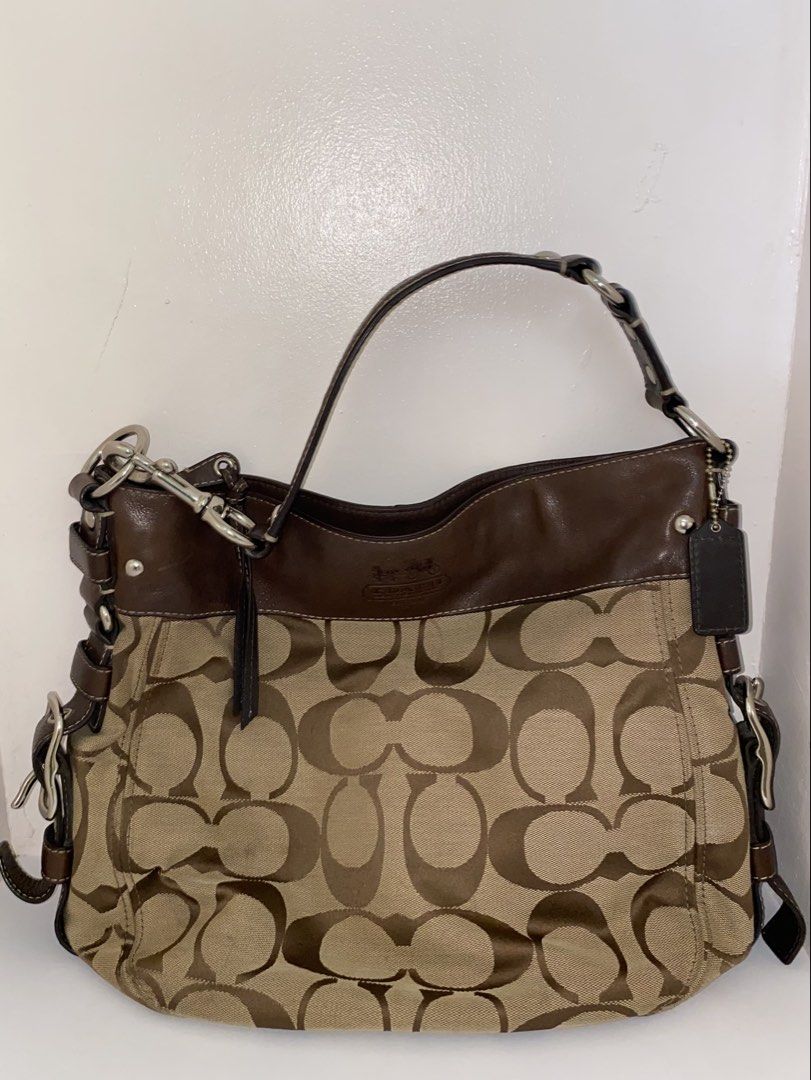 coach zoe large (Category: Luxury Bags & Wallets) located in Cebu City. Submitted by vaultsbypj (Listing ID 1470893775, Image 2). Description: coach zoe large in brown 🥥📦🥮🤎 authentic vintage ykk zippers silver hardwares (with fading) intact patterns with no visible scratches with creed inside the strap leather are intact, no other issues still negotiable 📍cebu city! can ship nationwide via jnt. 💌 .