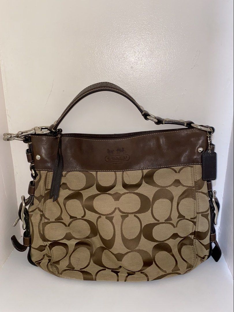 coach zoe large (Category: Luxury Bags & Wallets) located in Cebu City. Submitted by vaultsbypj (Listing ID 1470893775, Image 1). Description: coach zoe large in brown 🥥📦🥮🤎 authentic vintage ykk zippers silver hardwares (with fading) intact patterns with no visible scratches with creed inside the strap leather are intact, no other issues still negotiable 📍cebu city! can ship nationwide via jnt. 💌 .