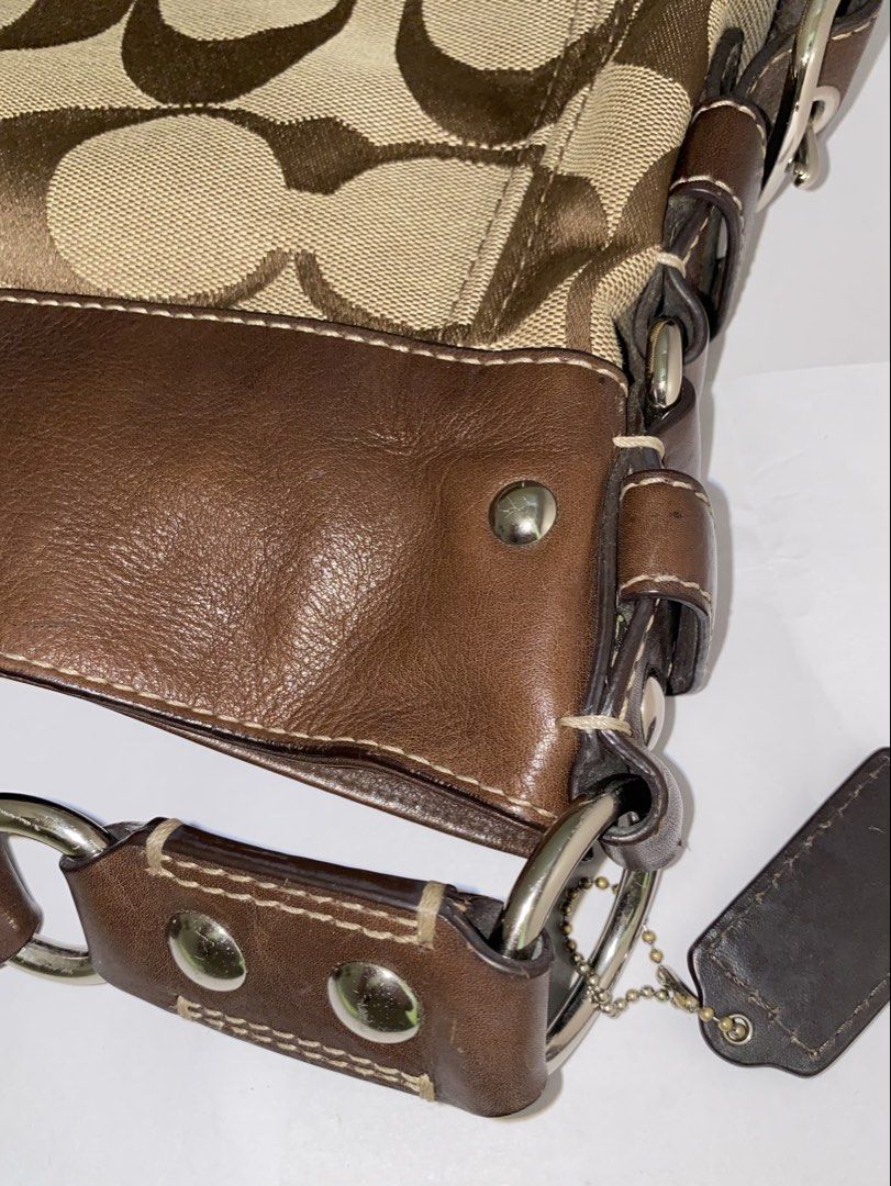 coach zoe large (Category: Luxury Bags & Wallets) located in Cebu City. Submitted by vaultsbypj (Listing ID 1470893775, Image 3). Description: coach zoe large in brown 🥥📦🥮🤎 authentic vintage ykk zippers silver hardwares (with fading) intact patterns with no visible scratches with creed inside the strap leather are intact, no other issues still negotiable 📍cebu city! can ship nationwide via jnt. 💌 .