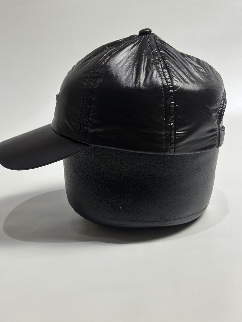 Collusion black nylon shiny baseball cap with silver hardware (Category: Caps & Hats) located in Daet. Submitted by thrifthings2018 (Listing ID 1470844943, Image 3). Description: - Brand: Collusion - Material: Lightweight shiny nylon with matte black brim - Design: Metal logo plate on front crown and structured stitched panel construction - Fit: Adjustable back strap with silver metal buckle - Condition: Clean and ready to wear.