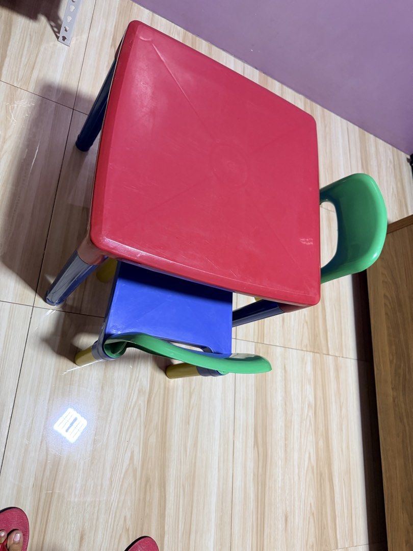 Colorful plastic kids table and chairs set (Category: Kids Tables & Chairs) located in Manila. Submitted by gelohey00 (Listing ID 1470784809, Image 1). Description: - Vibrant multi-color kids table with matching chairs (Red, blue, green, and yellow) - Sturdy and durable plastic construction - Perfect for arts and crafts, homework, or snack time - Smooth surface that is very easy to wipe clean - Condition: Used, kids have outlived its use No flaws