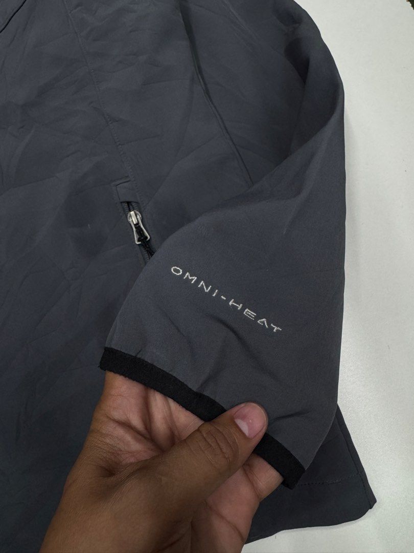 Columbia Omni-Heat Interchange Jacket Dark Grey Size L (Category: Coats, Jackets and Outerwear) located in Bustos. Submitted by thenlnclot60500 (Listing ID 1470823340, Image 3). Description: - Brand: Columbia - Color: Dark Grey - Size: L (Made in Vietnam) - Technology: Omni-Heat silver reflective thermal lining - Material: 92% Polyester, 8% Elastane - Features: Full zip closure up to the collar, 2 zippered front hand pockets - Condition: Clean an