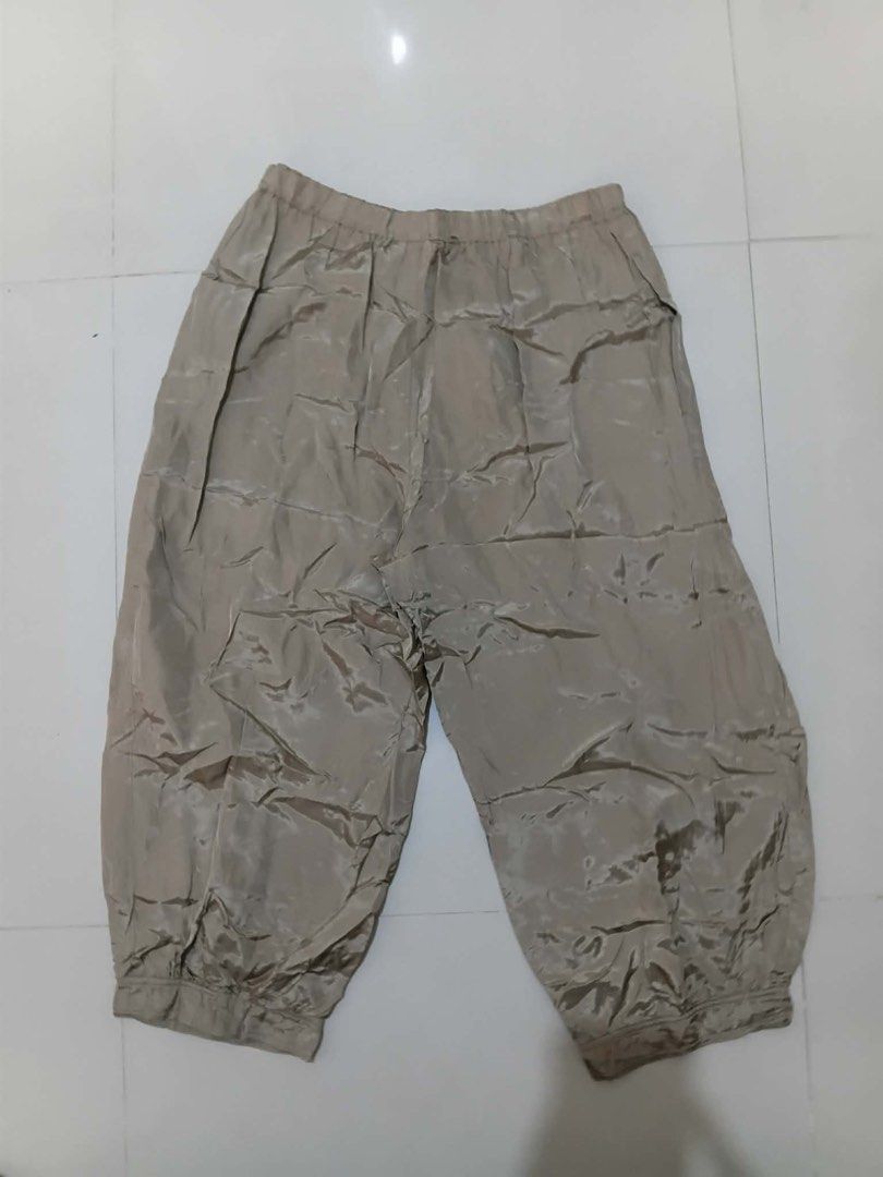 COMME des GARÇONS S4P021 Rayon Cropped Pants (Category: Trousers) located in Manila. Submitted by kuya_erick62 (Listing ID 1470759907, Image 1). Description: - Brand: COMME des GARÇONS - Color: Taupe - Size: Cropped fit - Material: 100% Rayon, Made in Italy - Features: Elastic waistband, gathered cuffs, lightweight feel, and stylish crumpled texture finish - Care: Dry clean only in a net bag - Condition: Excellent, ready to wear.
