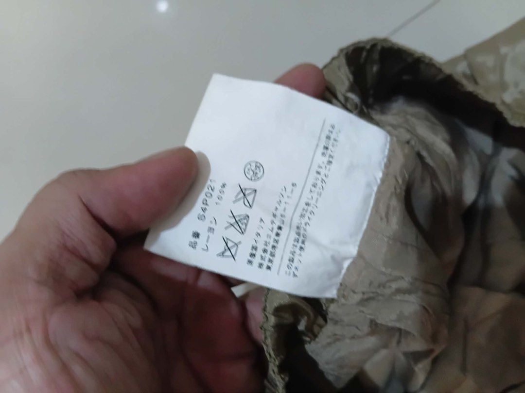 COMME des GARÇONS S4P021 Rayon Cropped Pants (Category: Trousers) located in Manila. Submitted by kuya_erick62 (Listing ID 1470759907, Image 3). Description: - Brand: COMME des GARÇONS - Color: Taupe - Size: Cropped fit - Material: 100% Rayon, Made in Italy - Features: Elastic waistband, gathered cuffs, lightweight feel, and stylish crumpled texture finish - Care: Dry clean only in a net bag - Condition: Excellent, ready to wear.