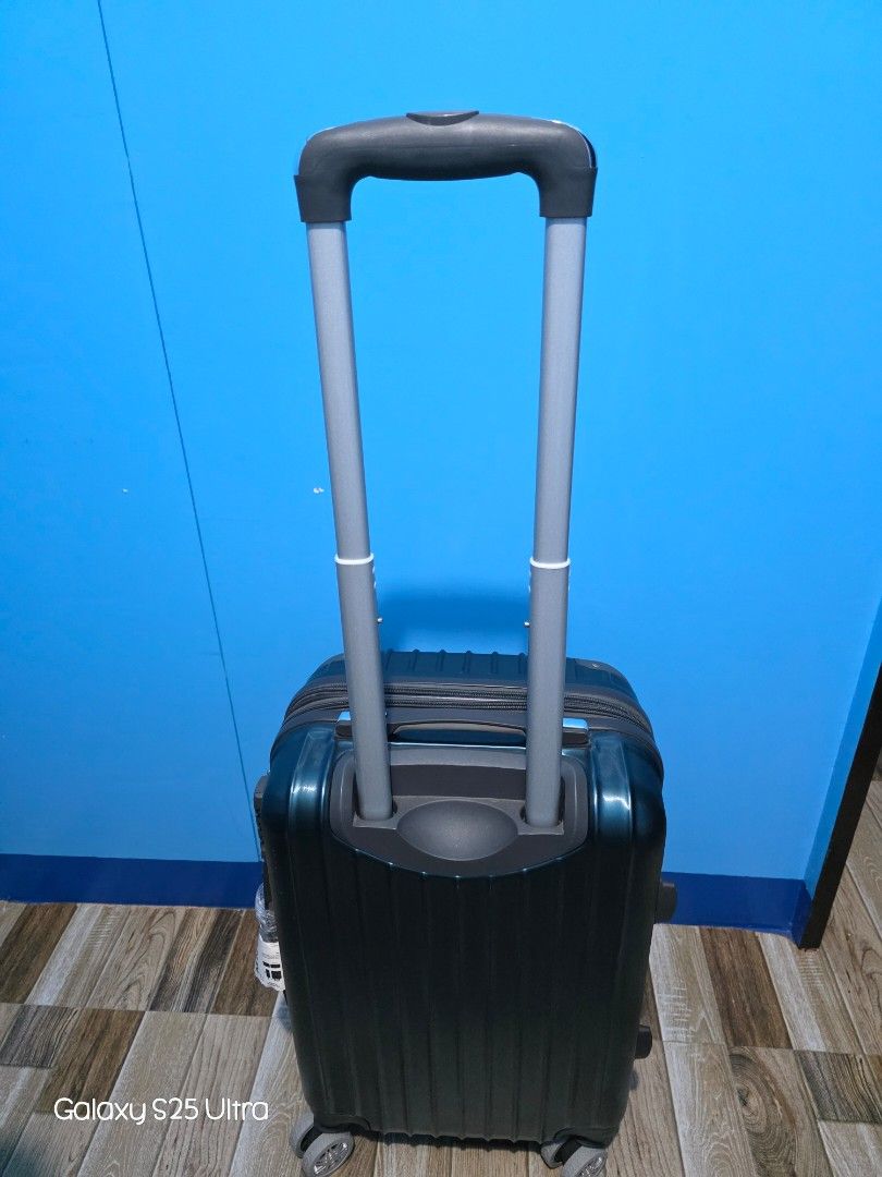 Compass Luggage (Category: Luggage) located in Lipa City. Submitted by pugnerd25 (Listing ID 1470839494, Image 3). Description: Compass Luggage Price: ₱2,500 RFS: Decluttering Pick up ONLY: Casa Feliz Subdivision Brgy Pusil Lipa City Brand: Compass ​Color: Metallic Deep Teal / Petrol Green Size: 20 inches / cabin size luggage ​Body Style: Vertical-ribbed hardshell case made of flexible, impact-resistant polycarbonate/ABS blend. ​Hardware & Corner