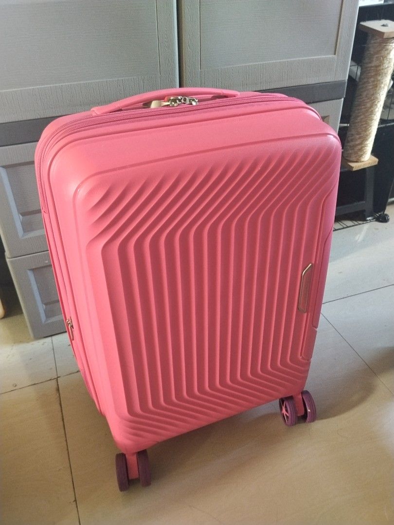 Compass Pink Hard Case Luggage With Lock (Category: Luggage) located in Quezon City. Submitted by shine_my_preloved (Listing ID 1470789557, Image 3). Description: Selling my cute pink travel luggage! 💗🧳 ✨ Details: - Color: Pink - Stylish ribbed pattern - Hard-shell suitcase - Included the Key and lock - Passcode - Handle: Extendable trolley handle - Closure: Zipper - Perfect for up to 7 Kilos - Good Condition and Slight use - No damaage 📍 Loca