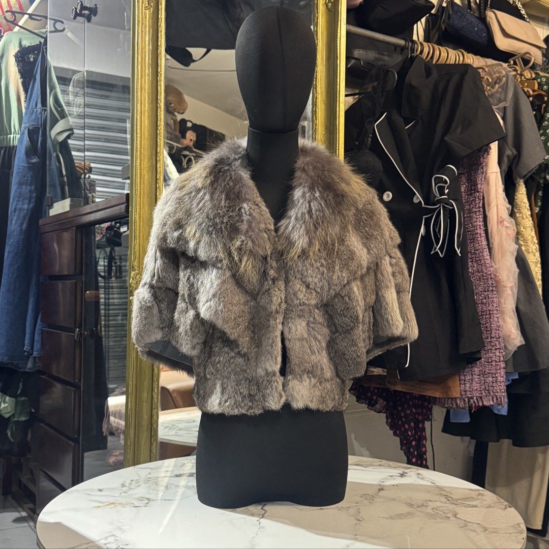 Connie & Na Grey real Fur blazer Size M (Category: Coats, Jackets and Outerwear) located in Rizal. Submitted by houseofbell (Listing ID 1470737604, Image 1). Description: Grey fur cape shrug from Connie & Na. Fluffy collar with layered panels throughout. Wild leopard print inner lining in gold and black tones. Size M tag attached. Hidden front fastening..