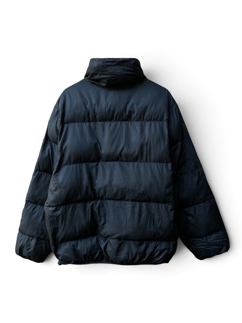 Converse Black Puffer Jacket Winter Coat Size L (Category: Coats, Jackets and Outerwear) located in Guihulngan. Submitted by johnrealvi59756 (Listing ID 1470883937, Image 2). Description: - Brand: Converse - Color: Classic Black - Size: US L / Euro L / Asia XL (180/104A) - Material: 100% Polyester (Shell, Lining, and Fill) - Design: Stand-up collar, full zip front, and two front flap pockets - Branding: Embroidered Converse logo on the left chest