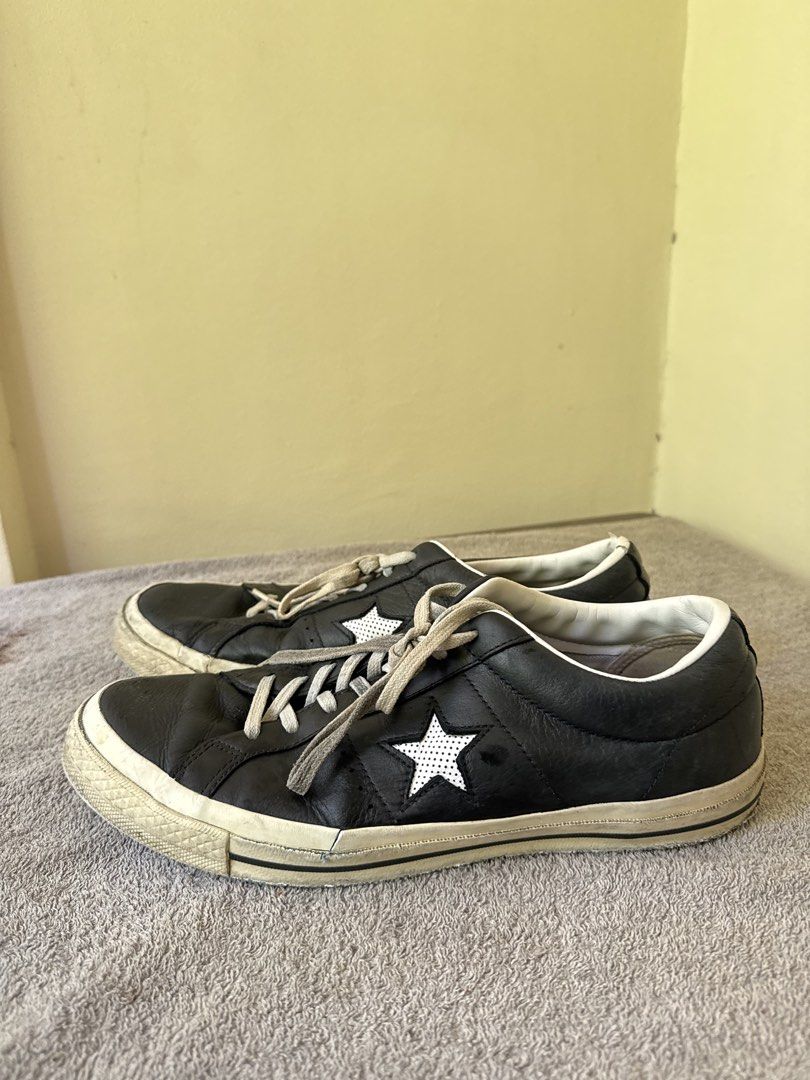 Converse One Star Black Leather Sneakers (Category: Sneakers) located in Calamba. Submitted by xacalixa (Listing ID 1470799895, Image 3). Description: - Brand: Converse - Model: One Star - Color: Black leather with white star logos and off-white laces - Style: Low-top, casual streetwear - Condition: Good pre-loved condition with some scuffs on white midsoles from regular use - Features: Comfortable fit, branded inner lining and insoles - Perfect 