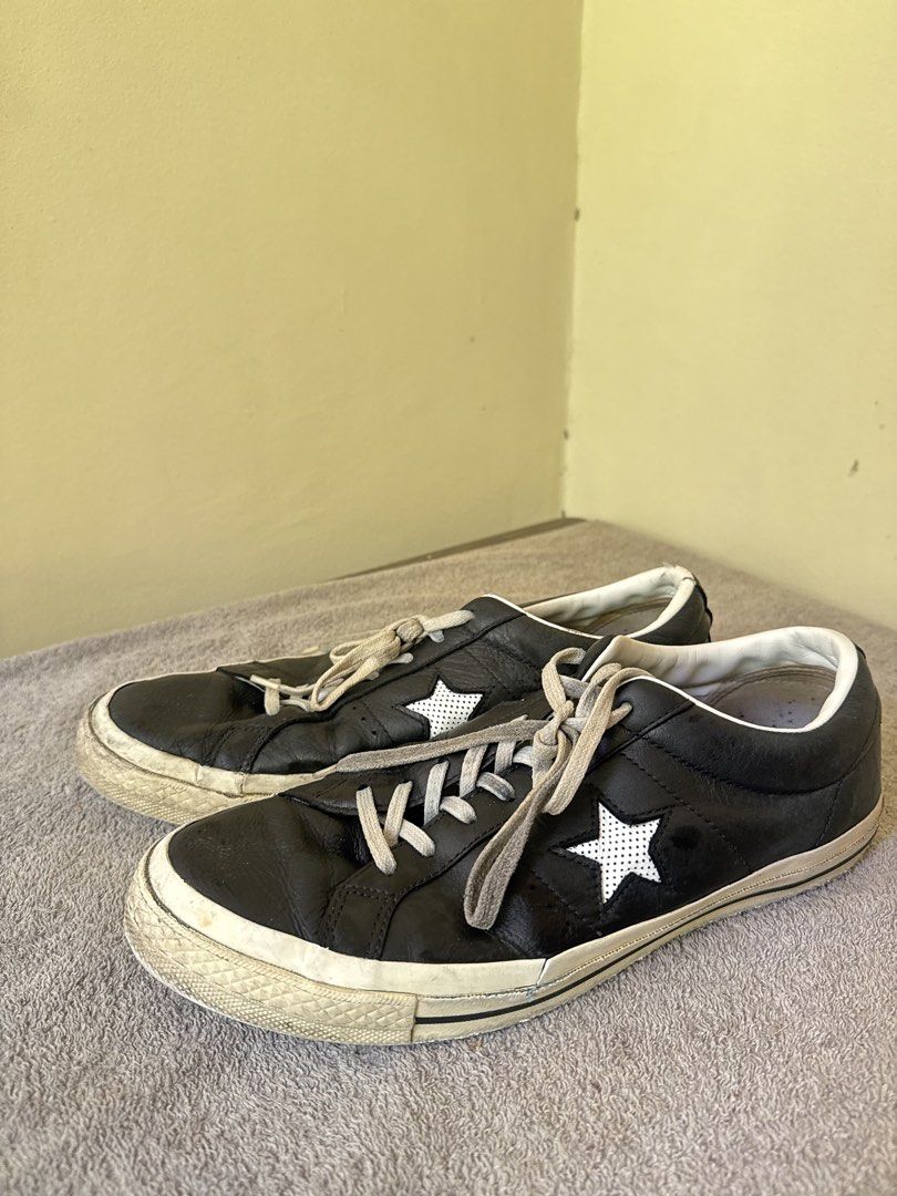Converse One Star Black Leather Sneakers (Category: Sneakers) located in Calamba. Submitted by xacalixa (Listing ID 1470799895, Image 1). Description: - Brand: Converse - Model: One Star - Color: Black leather with white star logos and off-white laces - Style: Low-top, casual streetwear - Condition: Good pre-loved condition with some scuffs on white midsoles from regular use - Features: Comfortable fit, branded inner lining and insoles - Perfect 
