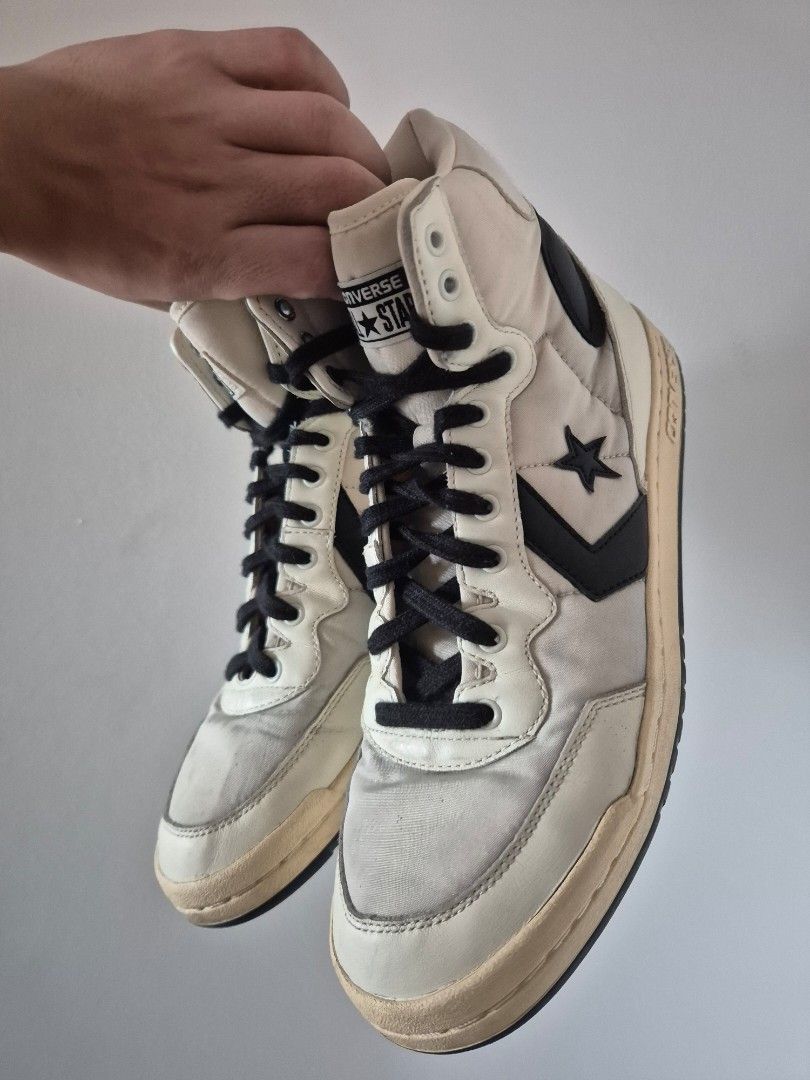 Converse Star Player High Top Sneakers Off-White Black (Category: Sneakers) located in Makati City. Submitted by tapsj (Listing ID 1470817122, Image 3). Description: - Brand: Converse - Style: High top sneakers (off-white and black with classic star chevron logo) - Size: US Men's 10 / US Women's 11.5 - Features: Black laces, padded collar, durable rubber outsole - Condition: Minor dirt marks on canvas upper and midsoles from regular use; soles st