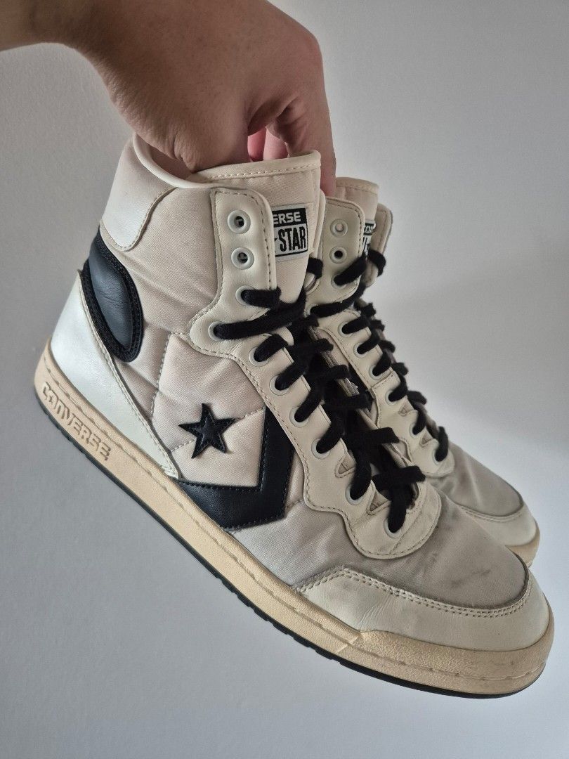 Converse Star Player High Top Sneakers Off-White Black (Category: Sneakers) located in Makati City. Submitted by tapsj (Listing ID 1470817122, Image 1). Description: - Brand: Converse - Style: High top sneakers (off-white and black with classic star chevron logo) - Size: US Men's 10 / US Women's 11.5 - Features: Black laces, padded collar, durable rubber outsole - Condition: Minor dirt marks on canvas upper and midsoles from regular use; soles st