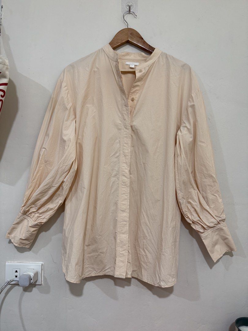 Cos Collarless Pleated Panel long sleeves salmon (Category: Longsleeves) located in Manila. Submitted by morningthrifters (Listing ID 1470844485, Image 3). Description: 📝Cos light peach or pale salmon-pink collarless long-sleeve blouse featuring a band collar, concealed button placket, and full voluminous sleeves with wide cuffs. 📍Pateros Metro Manila 🚚 Jnt / Lalamove / Pickup 📐 Size Small-Medium 💗 Second time buyers has a free item, follow 