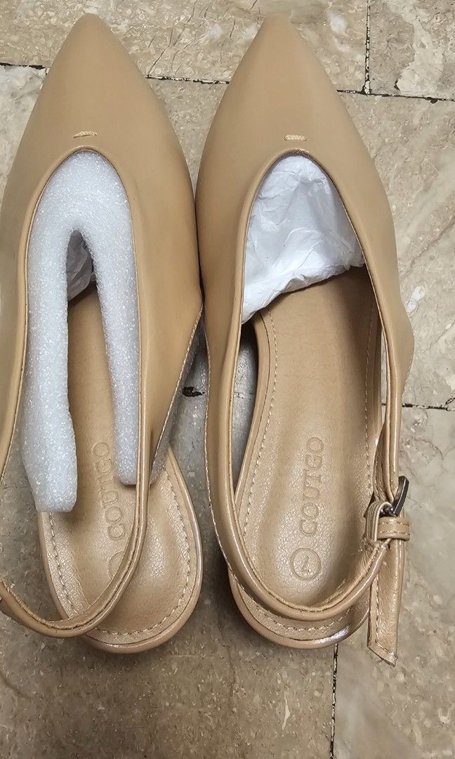 Coutgo Pointed Toe Slingback Pumps (Beige/Nude) - Size 7 (Category: Heels) located in Pasig City. Submitted by bubbles108 (Listing ID 1470870208, Image 2). Description: Selling a brand new, never-worn pair of Coutgo Pointed Toe Slingback Flats. Perfect for office wear, business casual, or smart casual outfits! Very chic and elegant silhouette. Details: • Brand: Coutgo (US Fashion Brand) • Size: Women's US 7 (Standard Fit) • Color: Nude / Apricot 