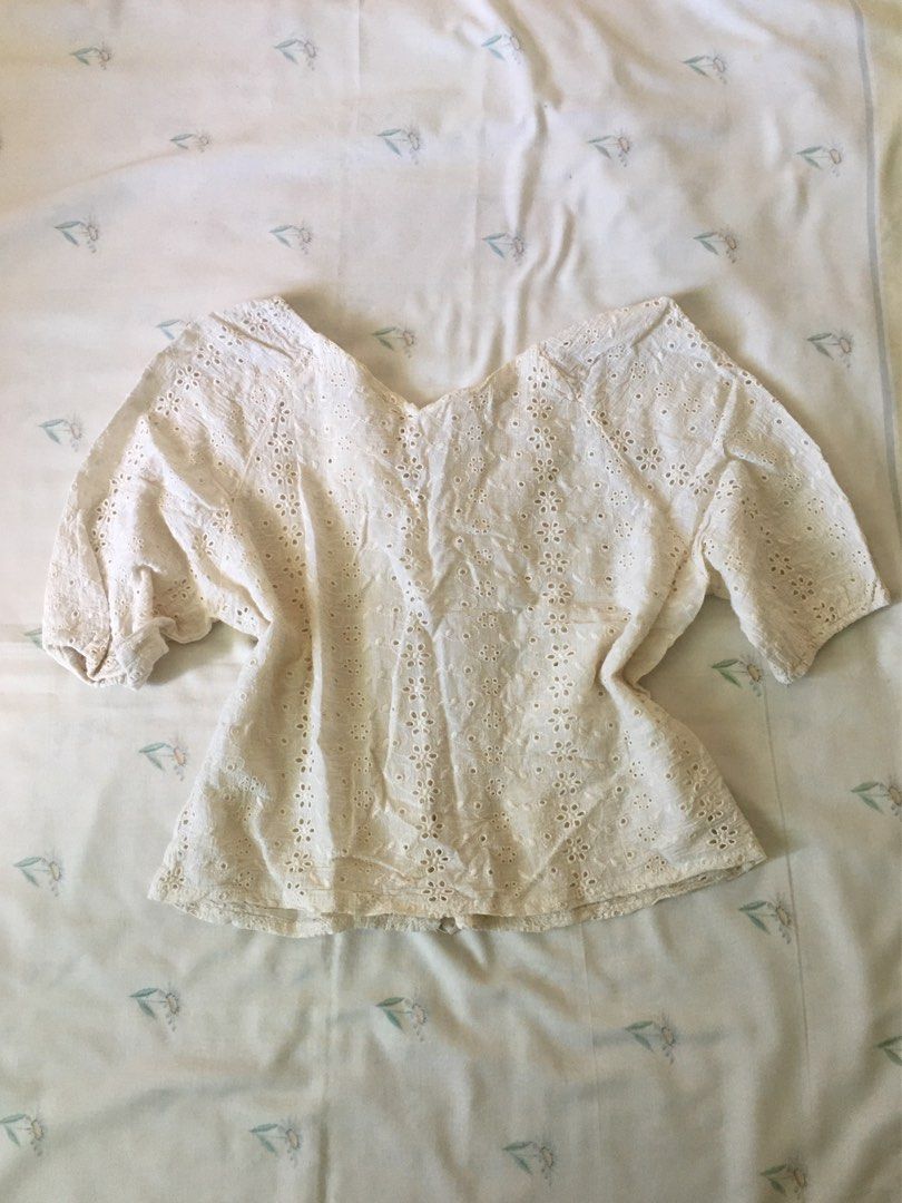 Cream Eyelet Lace blouse (Category: Blouses) located in Cabuyao City. Submitted by 4everblooms (Listing ID 1470773491, Image 2). Description: - Size: S - M - Details: Short puff sleeves, V-neckline.