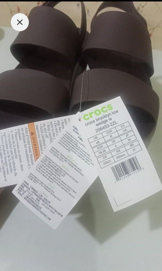 Crocs Brooklyn Low Wedge Sandals Brown Size W8 (Category: Flats & Sandals) located in Cagayan de Oro. Submitted by catheveron (Listing ID 1470927606, Image 3). Description: authentic crocs bought in 🇨🇦 brandnew with pouch tag and bag size 8 mushroom/mocha color mall price: 3995 - Brand new with original tags, never worn - Style: Crocs Brooklyn Low Wedge Sandals - Color: Brown with a chic two-strap design and adjustable slingback ankle strap - C