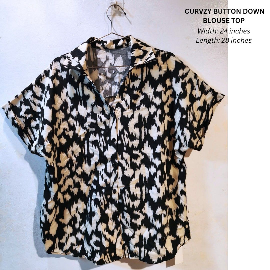 Curvzy button down blouse top (Category: Blouses) located in Quezon City. Submitted by trendyretro (Listing ID 1470915765, Image 1). Description: Brand new with tag and pouch 2xl on tag Button down design all buttons working.