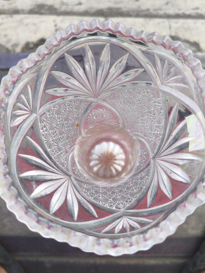Cut Crystal Glass Vase with Intricate Geometric Patterns (Category: Vases & Decorative Bowls) located in Manila. Submitted by tonio124 (Listing ID 1470785688, Image 2). Description: - Type: Heavy clear glass vase - Design: Detailed geometric cuts, fan motifs, and a striking hobnail pattern around the center - Details: Elegant scalloped rim and starburst design cut into the flat base - Quality: Heavyweight piece showcasing traditional craftsmanshi