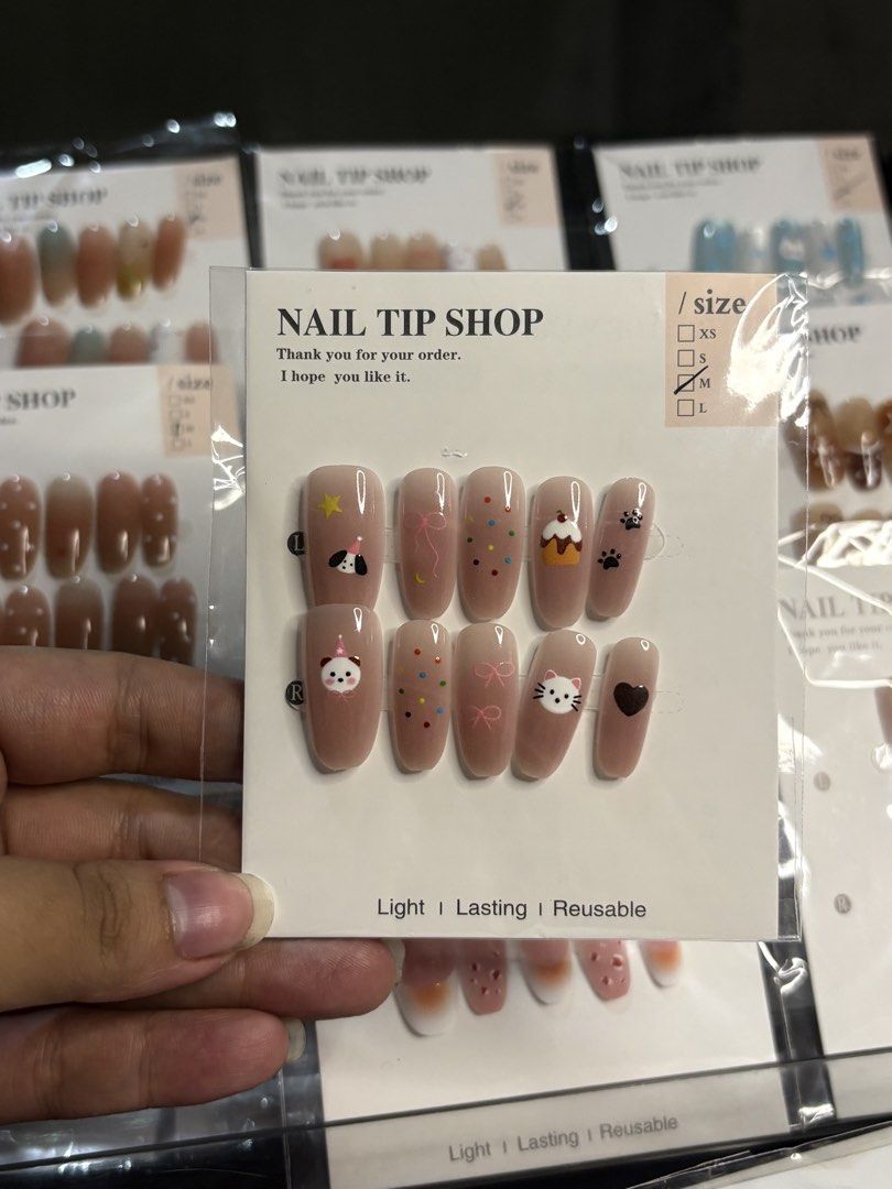 Cute Press-On Nail Tips - no glue nails only . (Category: Hands & Nails) located in Manila. Submitted by royalpengwen (Listing ID 1470791436, Image 3). Description: Wholesale price: 35 each 300 - 10pcs 375 - 15pcs 400 - 20pcs - Condition: Brand new / Unused in clean packaging - Size: random - Design: Cute pastel blue stars, bows, and little animals - Features: Lightweight, long-lasting, easy to apply and remove - Benefit: Perfect for quick salon-