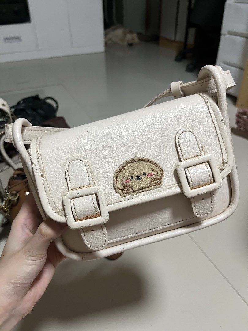Cute white shoulder bag with dog patch (Category: Cross-body Bags) located in General Trias. Submitted by walterwhiteyo (Listing ID 1470766008, Image 3). Description: see photos for the condition pls!.