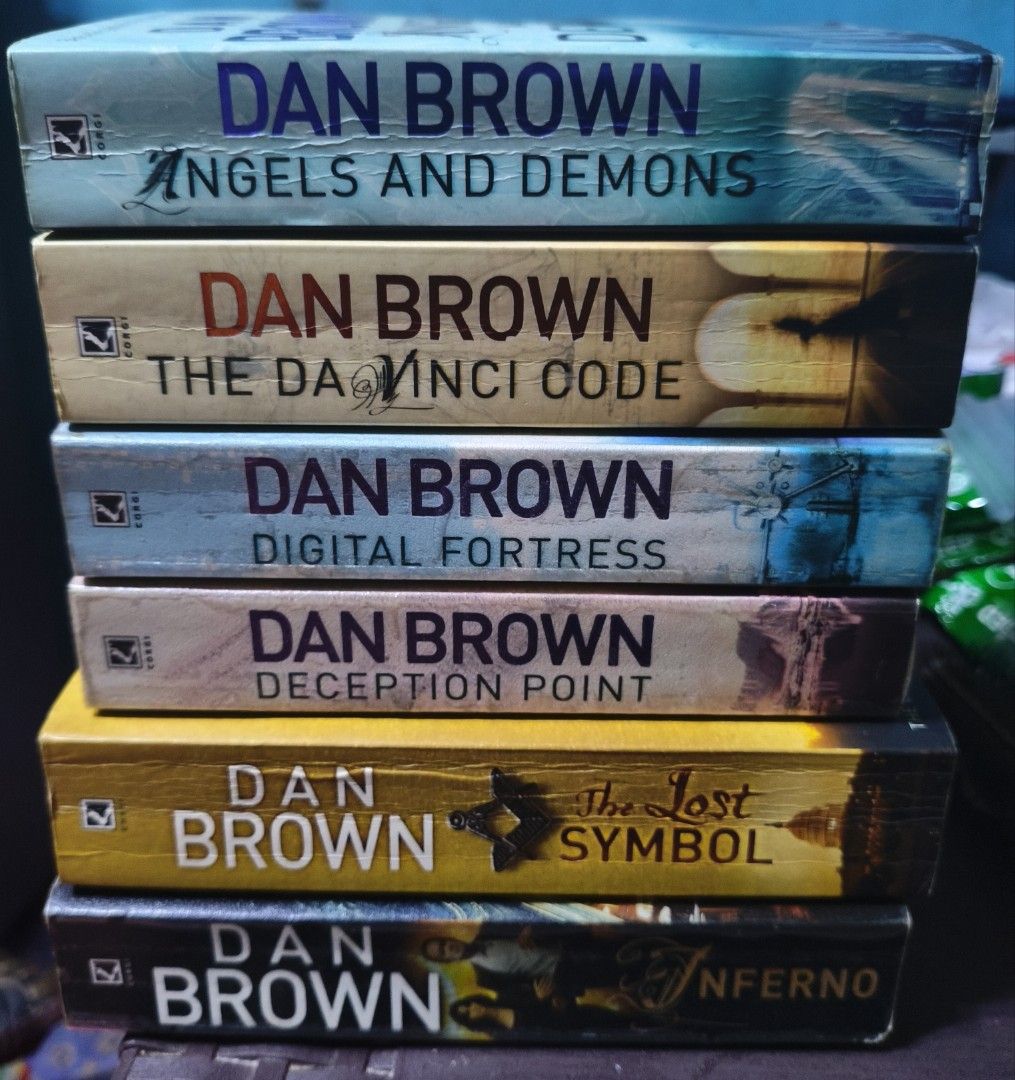 Dan Brown 6 Book Collection Set (Category: Storybooks) located in Manila. Submitted by dreamy_collections (Listing ID 1470895290, Image 1). Description: - Complete Dan Brown 6-book bundle: Angels & Demons, The Da Vinci Code, Digital Fortress, Deception Point, The Lost Symbol, and Inferno - Publisher: Corgi paperbacks - Condition: Shows yellowing/natural aging and crease marks on spines and covers from reading - Great value set for mystery and thr