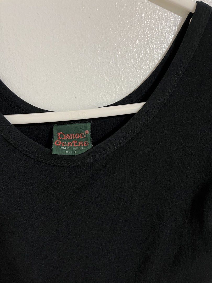 Dance Centre Black Skirted Leotard Dress (Category: Bikinis & Swimsuits) located in Cabuyao City. Submitted by rdtrmt (Listing ID 1470818018, Image 2). Description: - Brand: Dance Centre - Color: Solid black - Design: Short sleeves, scoop neck, and attached flared skirt - Use: Ideal for ballet class, rehearsals, and dance practice - Condition: Good, with clear brand tag shown.