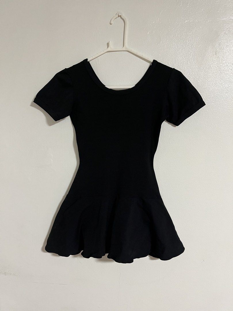 Dance Centre Black Skirted Leotard Dress (Category: Bikinis & Swimsuits) located in Cabuyao City. Submitted by rdtrmt (Listing ID 1470818018, Image 1). Description: - Brand: Dance Centre - Color: Solid black - Design: Short sleeves, scoop neck, and attached flared skirt - Use: Ideal for ballet class, rehearsals, and dance practice - Condition: Good, with clear brand tag shown.