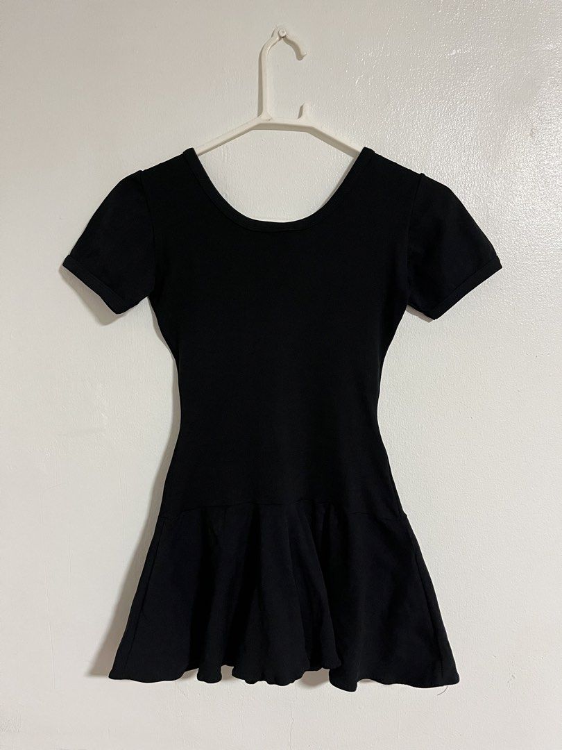 Dance Centre Black Skirted Leotard Dress (Category: Bikinis & Swimsuits) located in Cabuyao City. Submitted by rdtrmt (Listing ID 1470818018, Image 3). Description: - Brand: Dance Centre - Color: Solid black - Design: Short sleeves, scoop neck, and attached flared skirt - Use: Ideal for ballet class, rehearsals, and dance practice - Condition: Good, with clear brand tag shown.