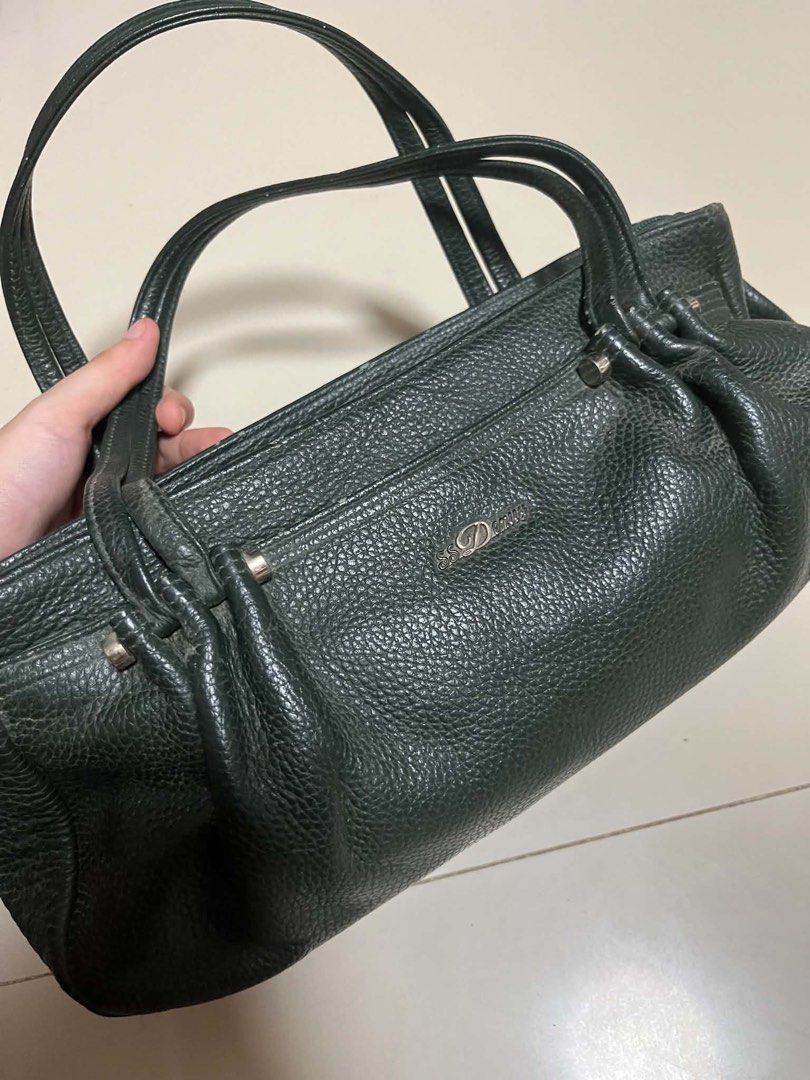 Dark Green Leather Shoulder Bag with Silver Hardware (Category: Shoulder Bags) located in Cavite. Submitted by starberrii (Listing ID 1470777493, Image 2). Description: - Color: Dark green with chic silver-tone hardware - Material/Texture: Pebbled texture with stylish pleated side gussets - Features: Dual top handles, zippered main compartment, and front pocket with metallic logo - Size: Medium, perfect for everyday essentials - Condition: Shows 