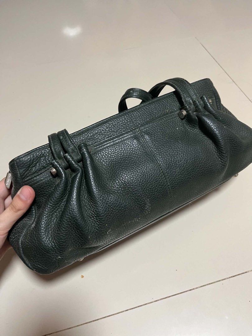 Dark Green Leather Shoulder Bag with Silver Hardware (Category: Shoulder Bags) located in Cavite. Submitted by starberrii (Listing ID 1470777493, Image 1). Description: - Color: Dark green with chic silver-tone hardware - Material/Texture: Pebbled texture with stylish pleated side gussets - Features: Dual top handles, zippered main compartment, and front pocket with metallic logo - Size: Medium, perfect for everyday essentials - Condition: Shows 