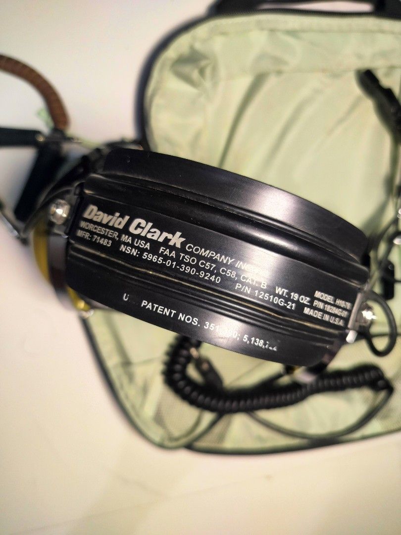 David Clark H10-76 Military Headset (Authentic USA) (Category: Other Sports Equipment and Supplies) located in San Antonio. Submitted by lansbitshop (Listing ID 1470884410, Image 2). Description: Condition: Good used condition. Soft gel ear seals, clean headband, and crisp coiled cord. Own an iconic piece of American aviation gear. This authentic, USA-made David Clark H10-76 Military Aviation Headset is built like a tank for extreme noise isolati
