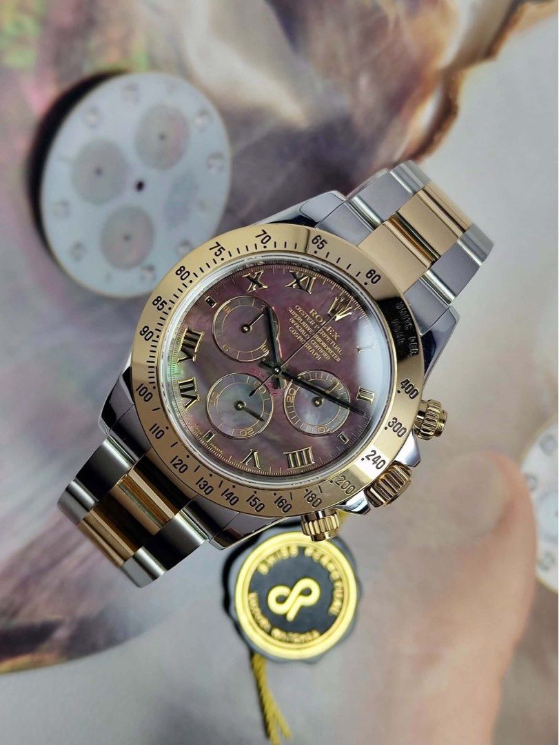 Daytona MOP Tahitian TT YG (Category: Men's Watches) located in Makati City. Submitted by swissperpetual (Listing ID 1470836629, Image 2). Description: Rolex Oyster Perpetual Daytona Cosmograph Mother of Pearl Tahitian (Dark Dial) Two Tone Yellow Gold 40mm 116523 Complete Set Condition: 9/10 (Excellent condition) Price: P1,248,000 Negotiable 🤝 7 Day Moneyback Guarantee 🧑‍🔧 1 Year SP Service Warranty 💱 Trades Offers and Pre-orders Accepted 💳 