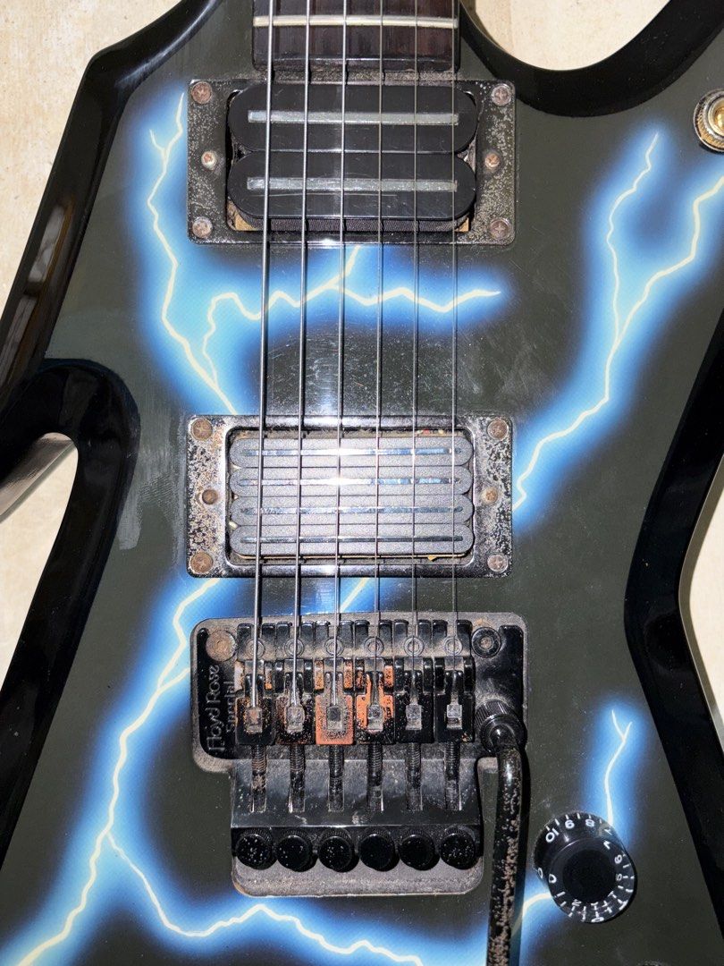Dean Dimebag ML Lightning Bolt Electric Guitar (Category: Musical Instruments) located in Manila. Submitted by chiswis.670412 (Listing ID 1470794338, Image 2). Description: BILHIN NYO NAH !!! DEAN DIMEBAG RAZORBACK RUSH LAST PRICE price: 20k php rfs: too big for me plug and play, fully setup, no wiring issues and with a fully padded gig bag included ( comes with a free mini amplifier ) issues: rusty floyd rose and damaged paint chips on the botto