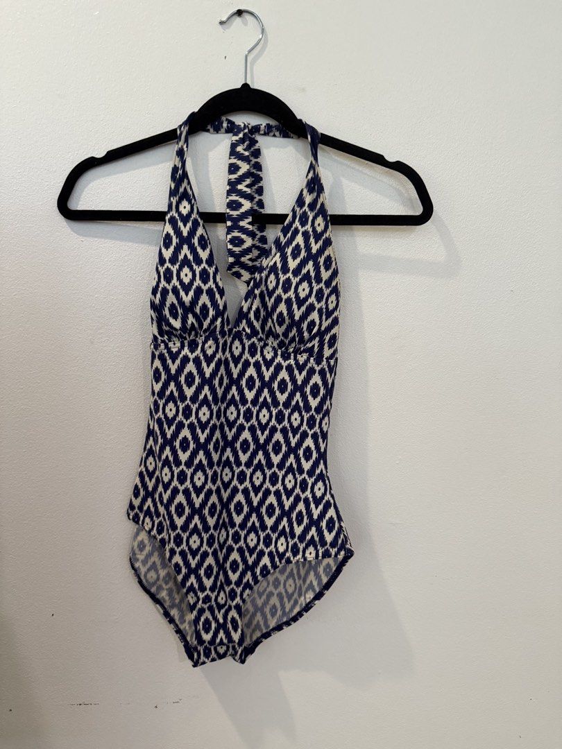 Debenhams Blue White Pattern Halter Neck Swimsuit Size 10 (Category: Bikinis & Swimsuits) located in Makati City. Submitted by jcalmartz (Listing ID 1470748509, Image 1). Description: - Brand: Debenhams - Style: One-piece swimsuit with halter neck tie - Pattern: Blue and white geometric ikat - Features: Molded cups, standard coverage bottom - Size: UK 10 / EUR 38 / US 6 (tag attached) - Origin: Made in Cambodia - Condition: Brand new with tags.