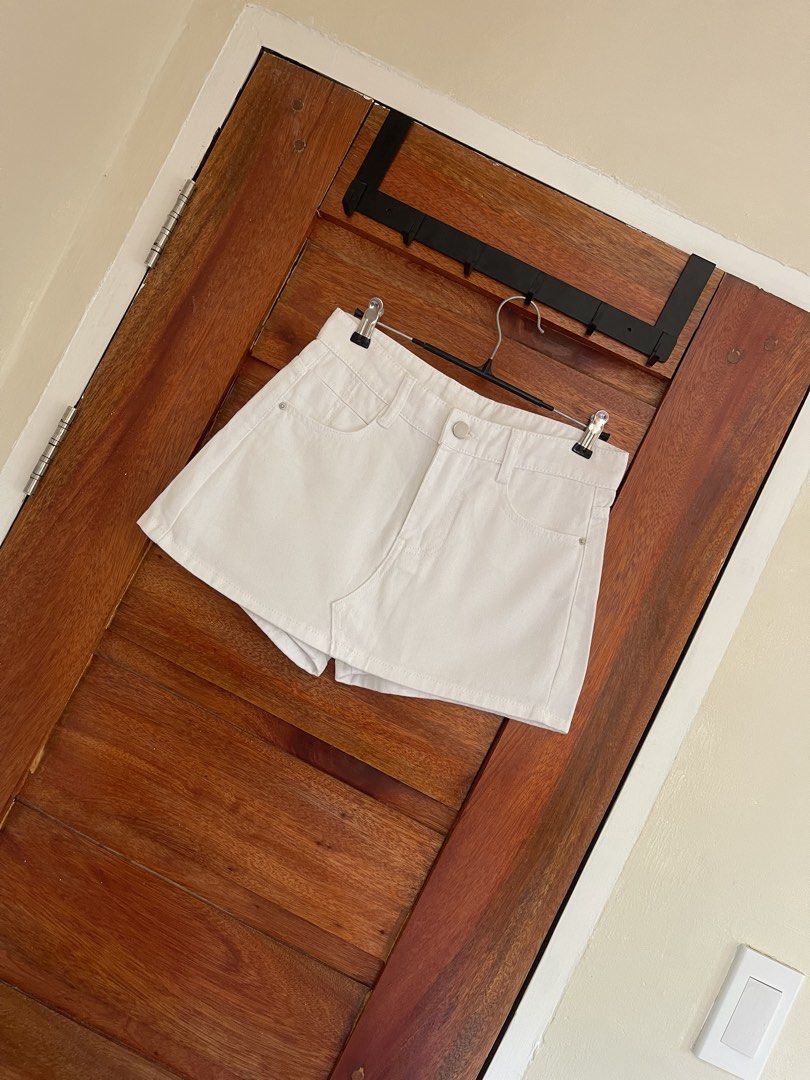 Denim Mini Skort (Category: Other Bottoms) located in Baler. Submitted by declutterwithrhys (Listing ID 1470797361, Image 3). Description: FOR SALE (PLEASE MAKE READING A HABIT) DENIM MINI SKORT COLOR WHITE WITH SIDE POCKETS (FRONT AND BACK) SIZE SMALL ON TAG LIKE NEW CONDITION CAN PASS AS BN CAN FIT SIZE 27 TO 28 WAISTLINE LENGTH 12 INCHES | LEG HOLE 10 INCHES COLOR RATE 9.5/10 NO ISSUE KINDLY CHECK THE PHOTOS FOR THE COMPLETE DETAILS SUPER NICE