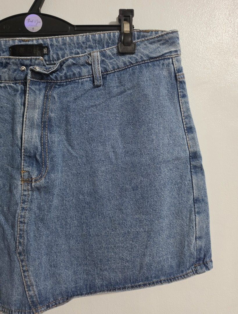 Denim Skort Size 3XL Asymmetrical Wrap Shorts (Category: Skirts) located in Paranaque City. Submitted by franinnashop (Listing ID 1470841967, Image 2). Description: Declutter - Style: Denim skort with front skirt flap and built-in shorts - Wash: Mid blue - Size: 3XL (Waist: 34 inches, Length: 15 inches) - Design: Asymmetrical wrap front - Flaw: Missing button on the waistband (great DIY project or easy fix!) - Condition: Pre-loved, ready for a ne