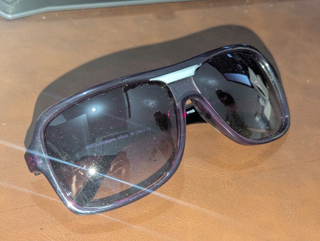 D&G Dolce & Gabbana 8068 Sunglasses (Category: Sunglasses & Eyewear) located in Manila. Submitted by _neku (Listing ID 1470743671, Image 1). Description: - Brand: D&G Dolce & Gabbana - Model: 8068 (1525/33), Made in Italy - Style: Bold square frame in purple with dark gradient lenses - Details: Distinctive metal D&G logo lettering on both temples - Dimensions: Lens 61mm, Bridge 13mm, Temple 130mm - Condition: Excellent designer eyewear ready to w