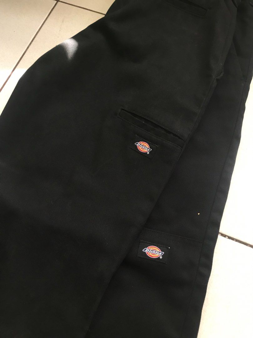 Dickies Black Cargo Pants with Double Logo Patches (Category: Jeans) located in Manila. Submitted by peakflow. (Listing ID 1470869244, Image 2). Description: • BLACK • EXCELLENT CONDITION • Waistline 32 • Length 41 • Leg hole 8.5 • Color rate 10/10 • Price 📥.